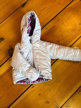 The North Face Light Purple Hooded Puffer Jacket with Floral Lining